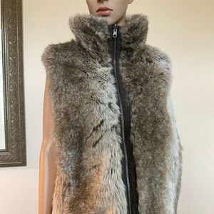 Reversible vest, faux fur for fancy or plain brown for casual, like new, large